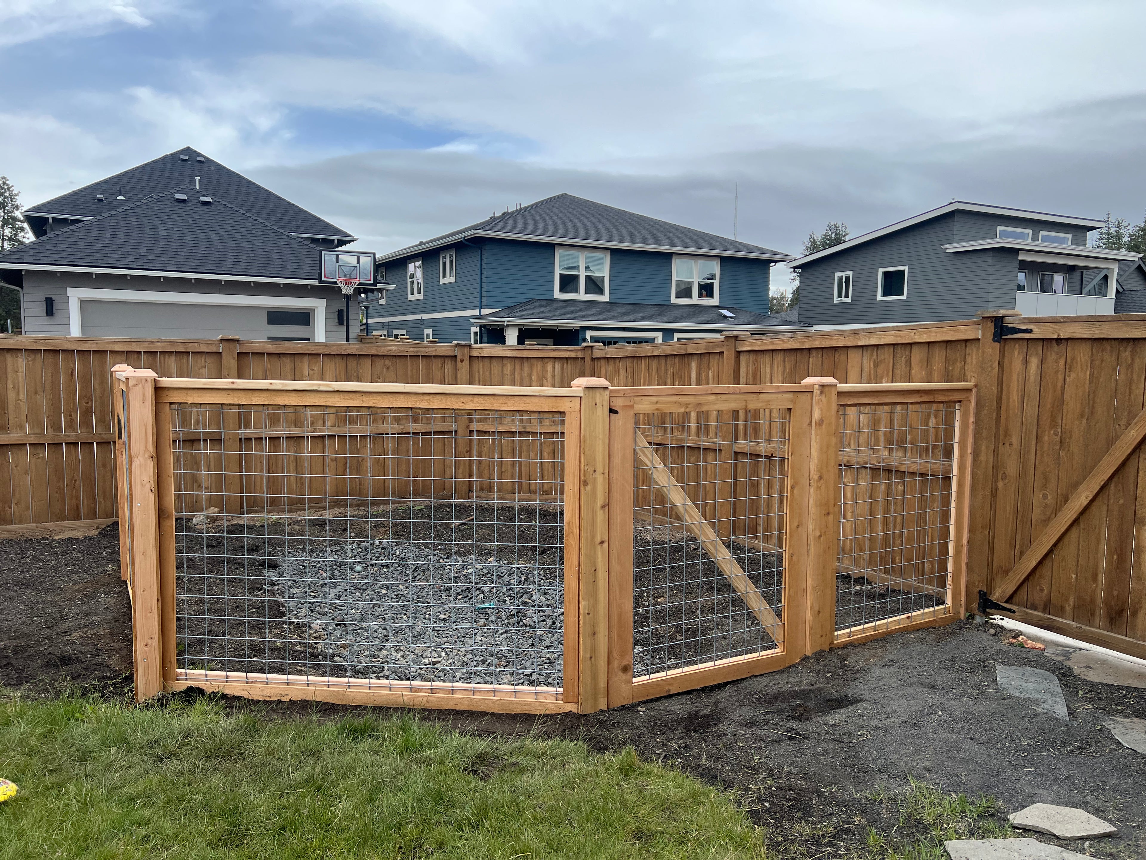 Hog panel custom wood fencing