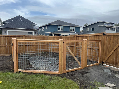 Hog panel custom wood fencing