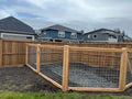 Hog panel custom wood fencing