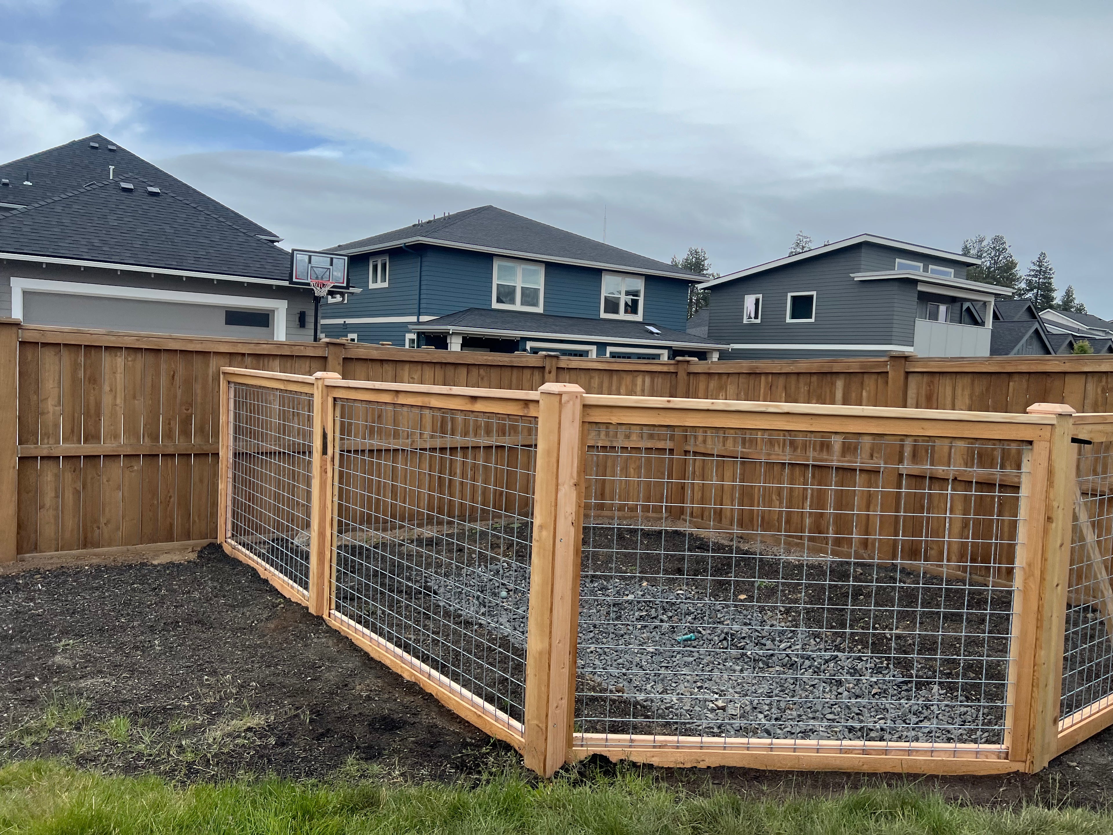 Hog panel custom wood fencing